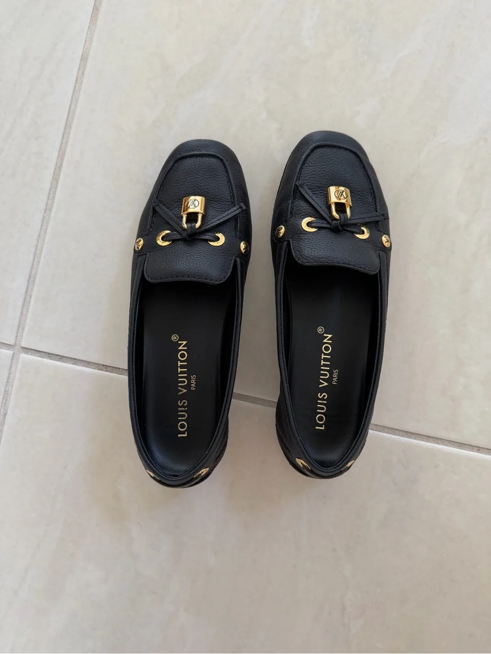Louis Vuitton Black Leather Loafers with Gold Accent Hardware